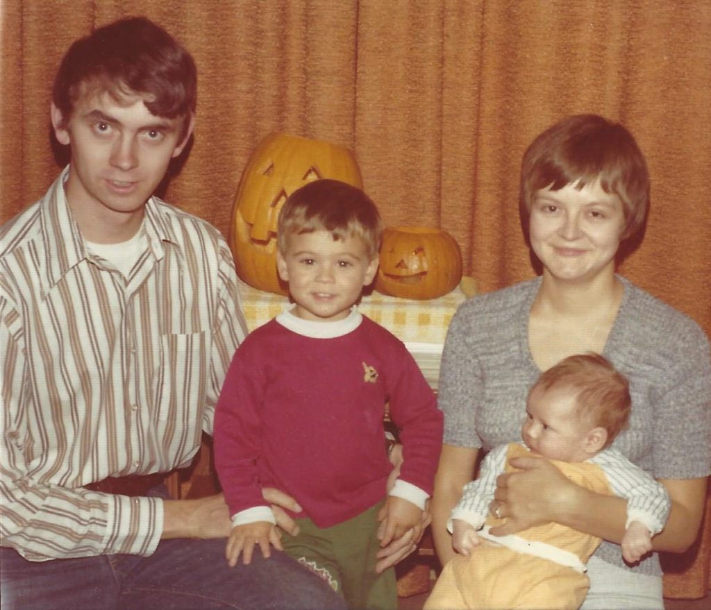 A shot of the Pithan family from the 1970s. Jack-o-lanterns can be seek in the background