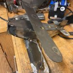 A metal rendition of a WWII-era fighter plane