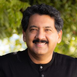 A headshot of Nirmal Nair