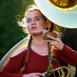 What does community sound like? For Anna Hackbarth, it’s marching band music