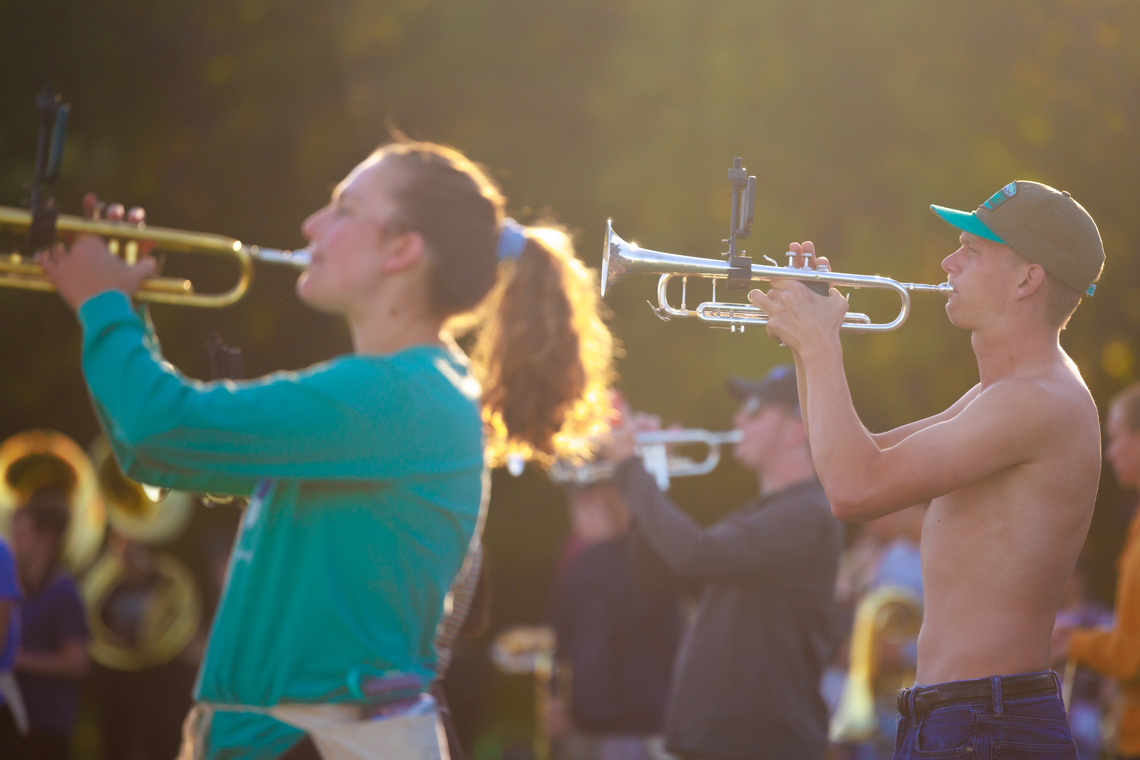 Two trumpet players at marching band practice 