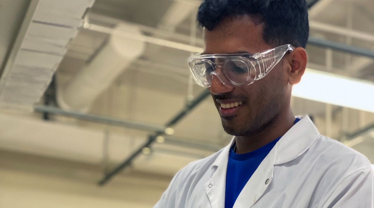 Dhananjay Dileep conducting research in the lab.