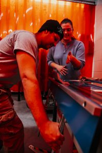 Students in Dolphin's class bending metal