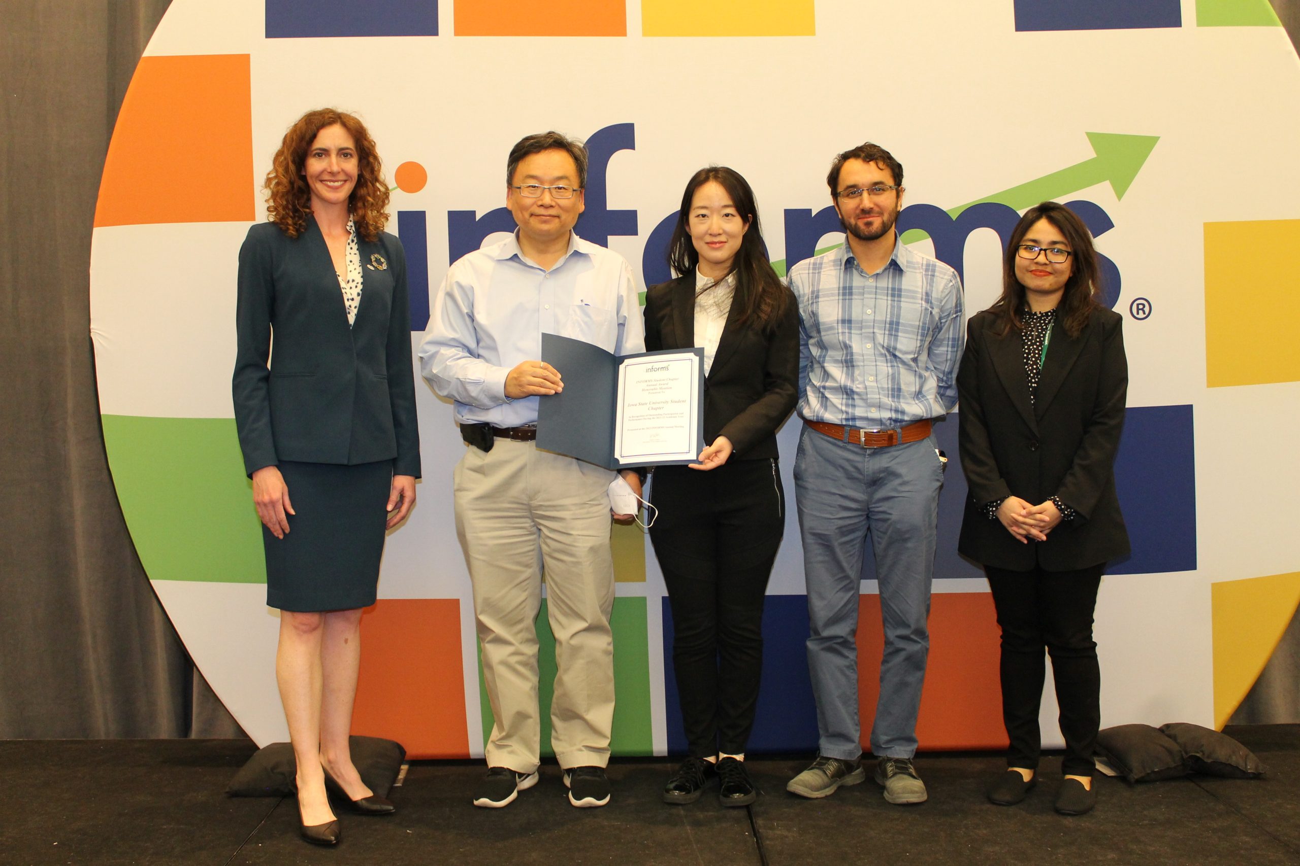 Zhuoyi Zhao, INFORMS Iowa State Student Chapter President and members at the Student Award Ceremony.