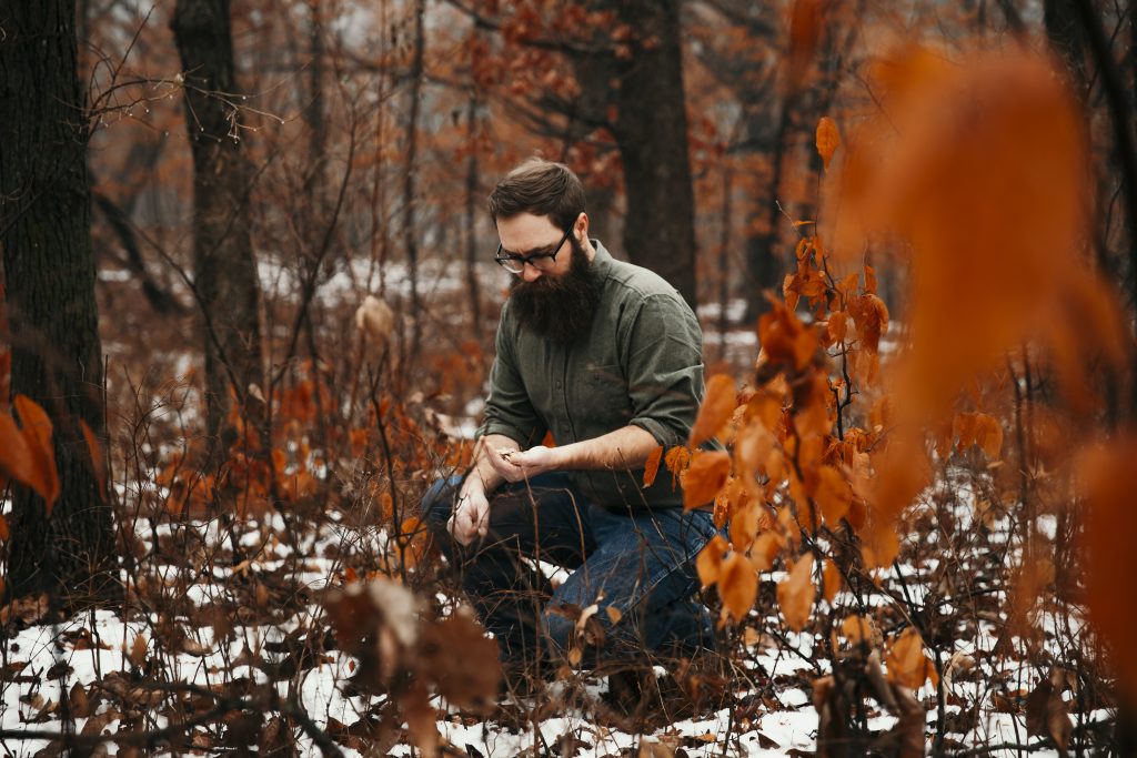 Billy holding the woodchips