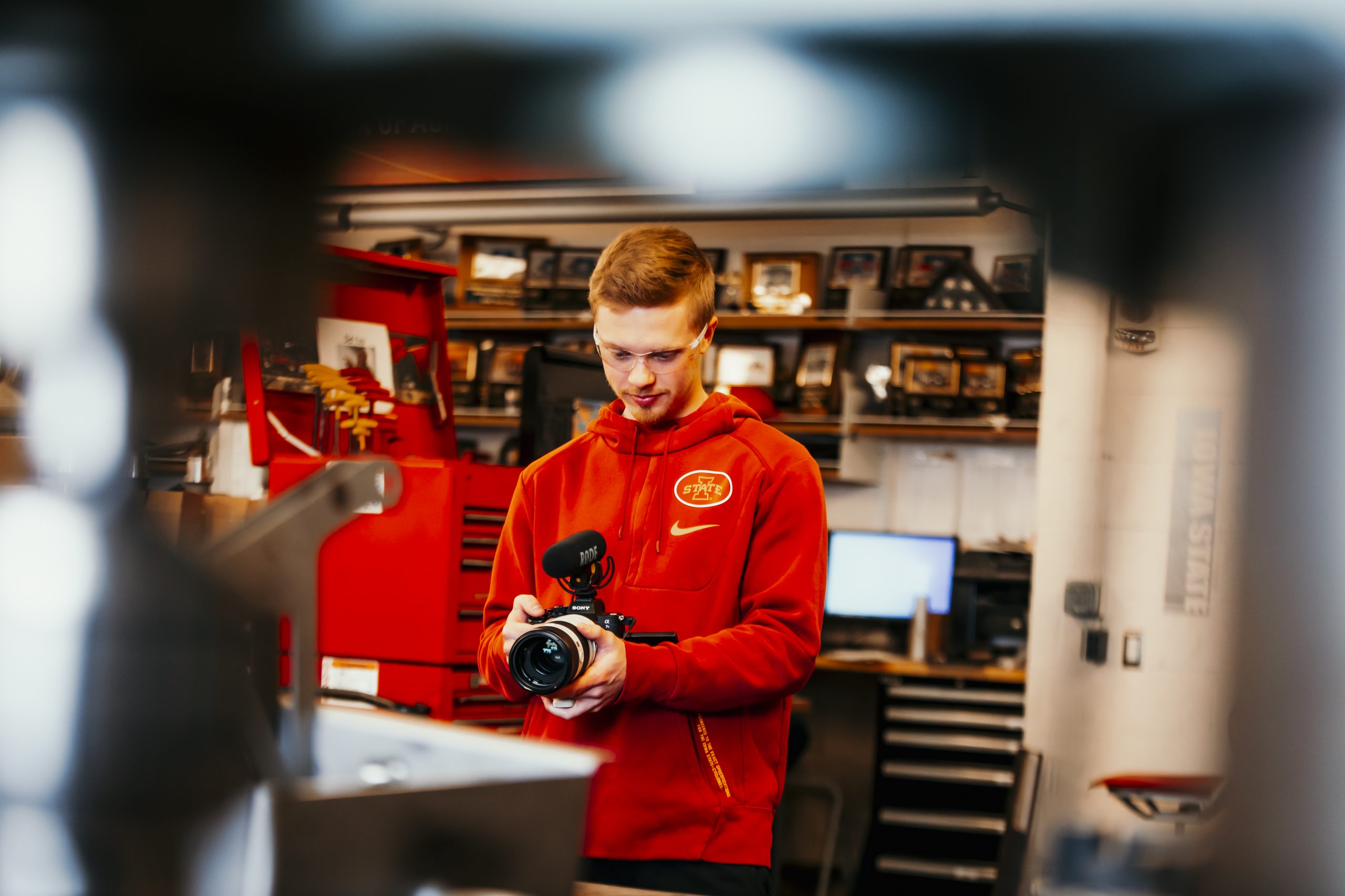 Ian Stravers holding video camera 