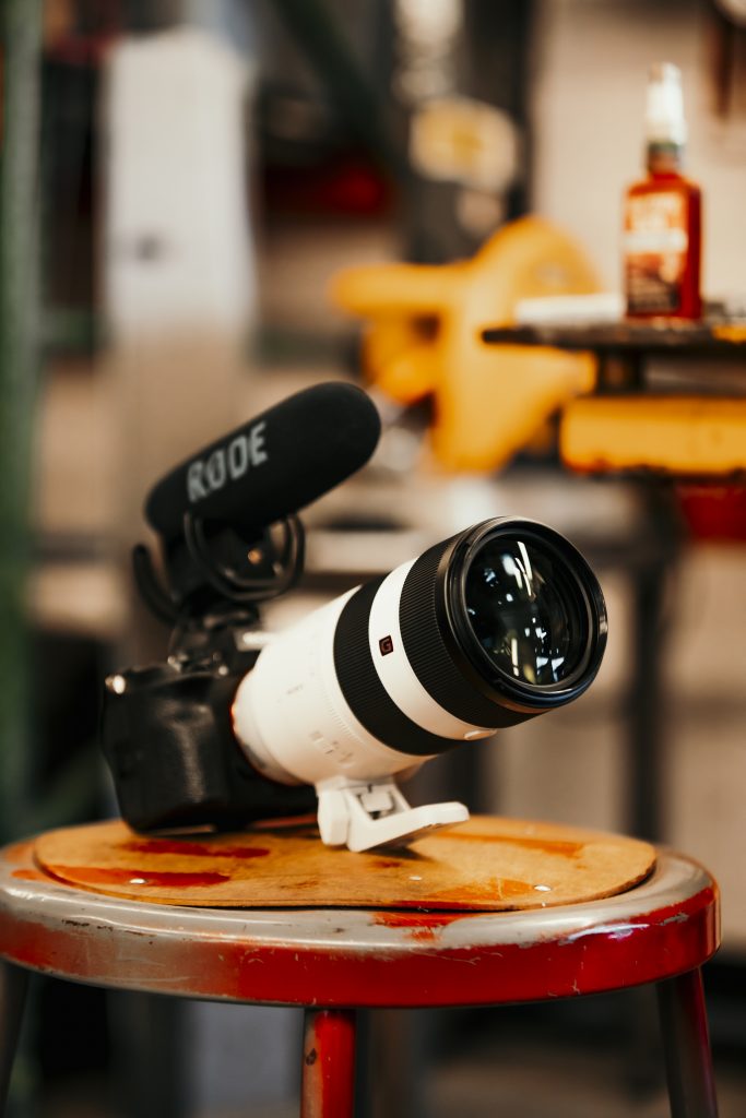 Video camera sitting on stool 