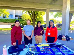 Thivani and Grad SWE executive officers man a table at the ISU Fall 2022 Career Fair. 