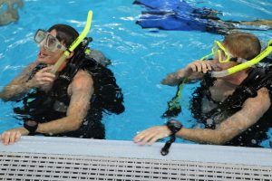 SCUBA students in pool with grear