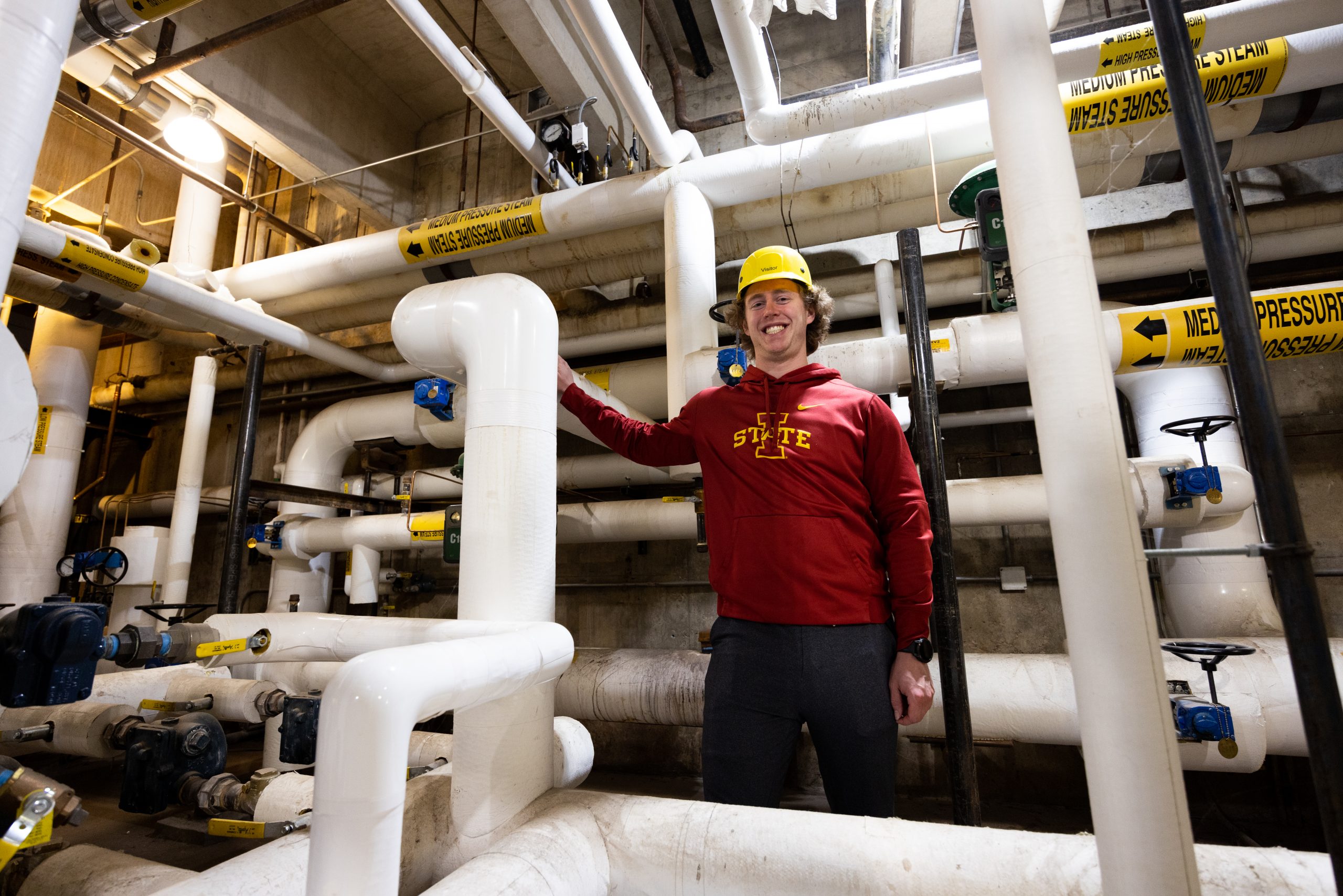 EE Senior Stuart Pearson standing in the steam tunnels under Towne Engineering building. 