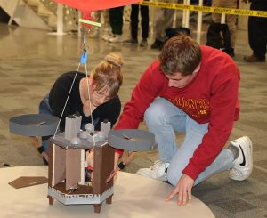 Carolyn Riedel with student and craft in Lighter Than Air competition
