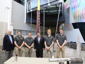 Bond with International Space Station Director Joel Montalbano and student members of Cyclone Rocketry team