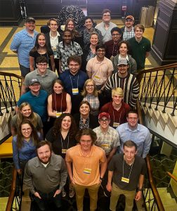 Full group of ISU students and faculty mentor participants in conference