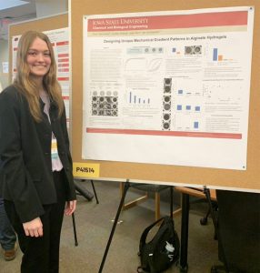 Zoe Ostrowski with her research poster