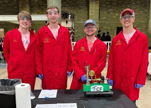 Members of "ISU Bridge" Chem-E-Car team with car