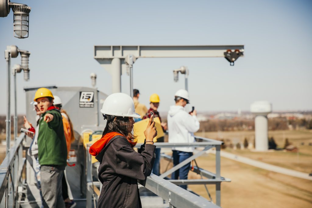  Students taking photos of what they see on site