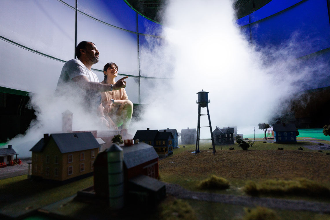 Student observing the tornado simulator