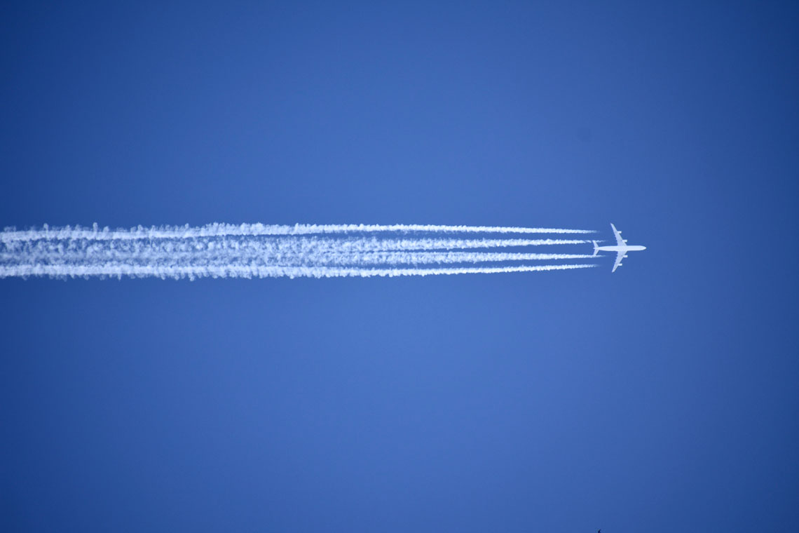 Plane flying through the air