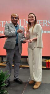 Ellie Diersen with award and Partha Sarkar