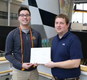 TEX award recipient Andrew Fung with major professor Travis Grager