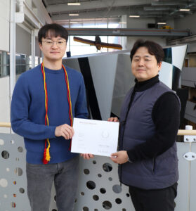 TEX Award recipient Youngro Lee with major professor Dae-Young Lee