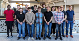 Members of MAVRIC student team in group photo in Department of Aerospace Engineering