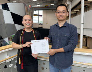 TEX-REX award recipient Lean Fang with award certificate and major professor Ping He