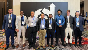 Iowa State University Dept. of Aerospace Engineering students from Hui Hu research group with Hu and department chair Wayne Chen at Las Vegas AIAA conference