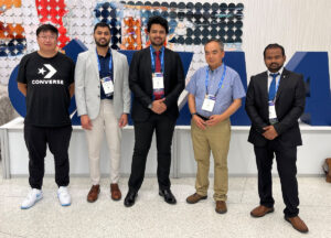 The co-authors of the awarded paper and faculty member Hui Hu in a group photo at the Las Vegas conference