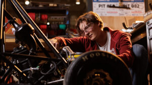 Erick Shoesmith works on the ISU Formula SAE vehicle.