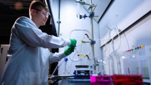 Andrew White, a senior in materials engineering, works in a lab.