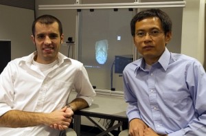 [Photo] Nik Karpinsky, left, and Song Zhang show off a 3-D image of Zeus.